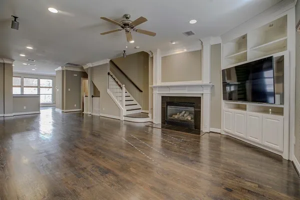 a kitchen with stainless steel appliances granite countertop a refrigerator microwave and sink