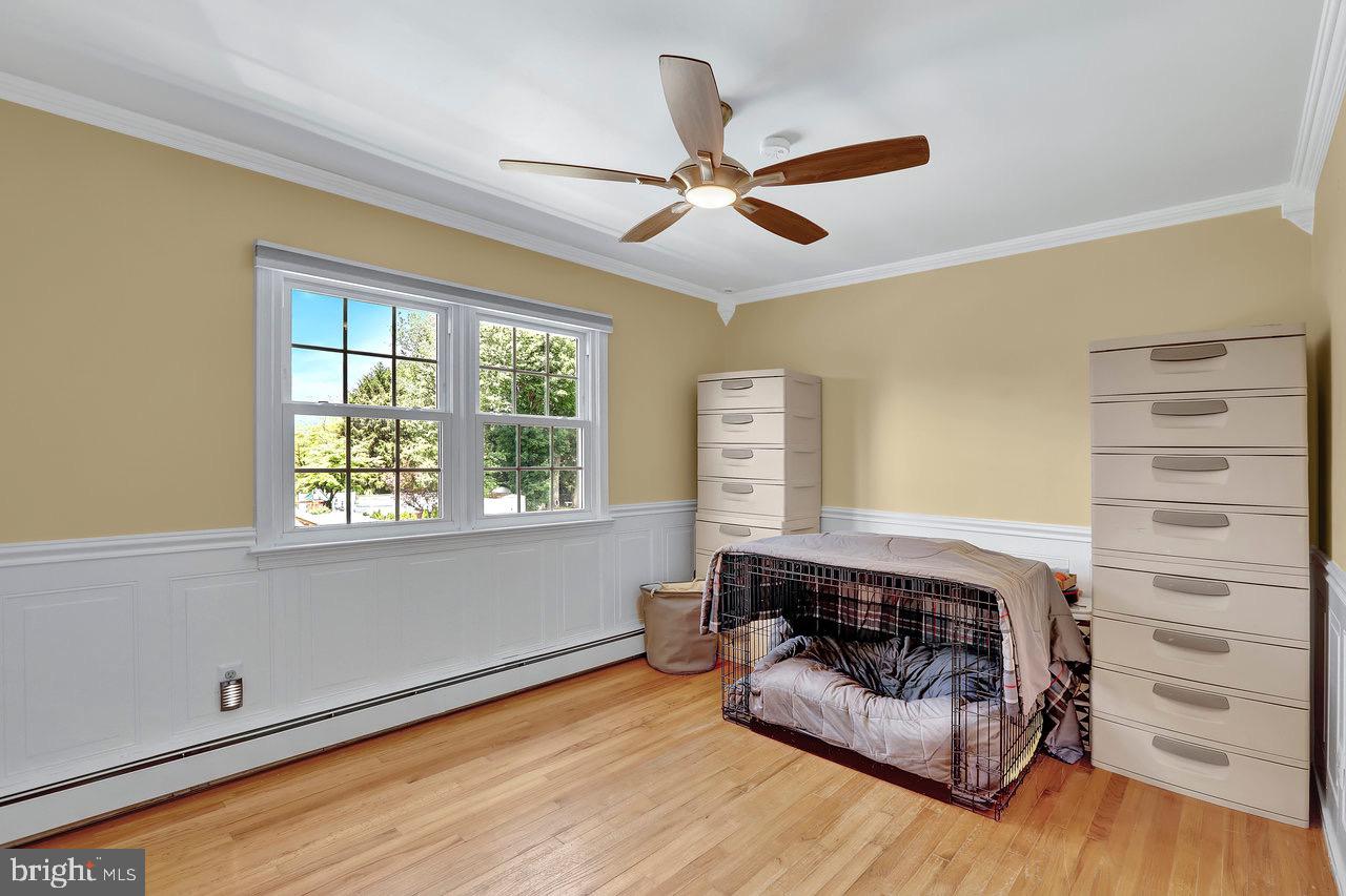199 Applegate Drive Hamilton, NJ 08690 - Photo 27 of 40 a living room with furniture and a fireplace