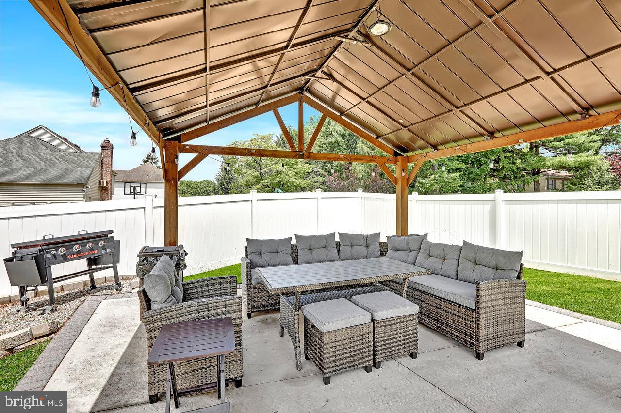199 Applegate Drive Hamilton, NJ 08690 - Photo 36 of 40 a outdoor living space with furniture and garden view
