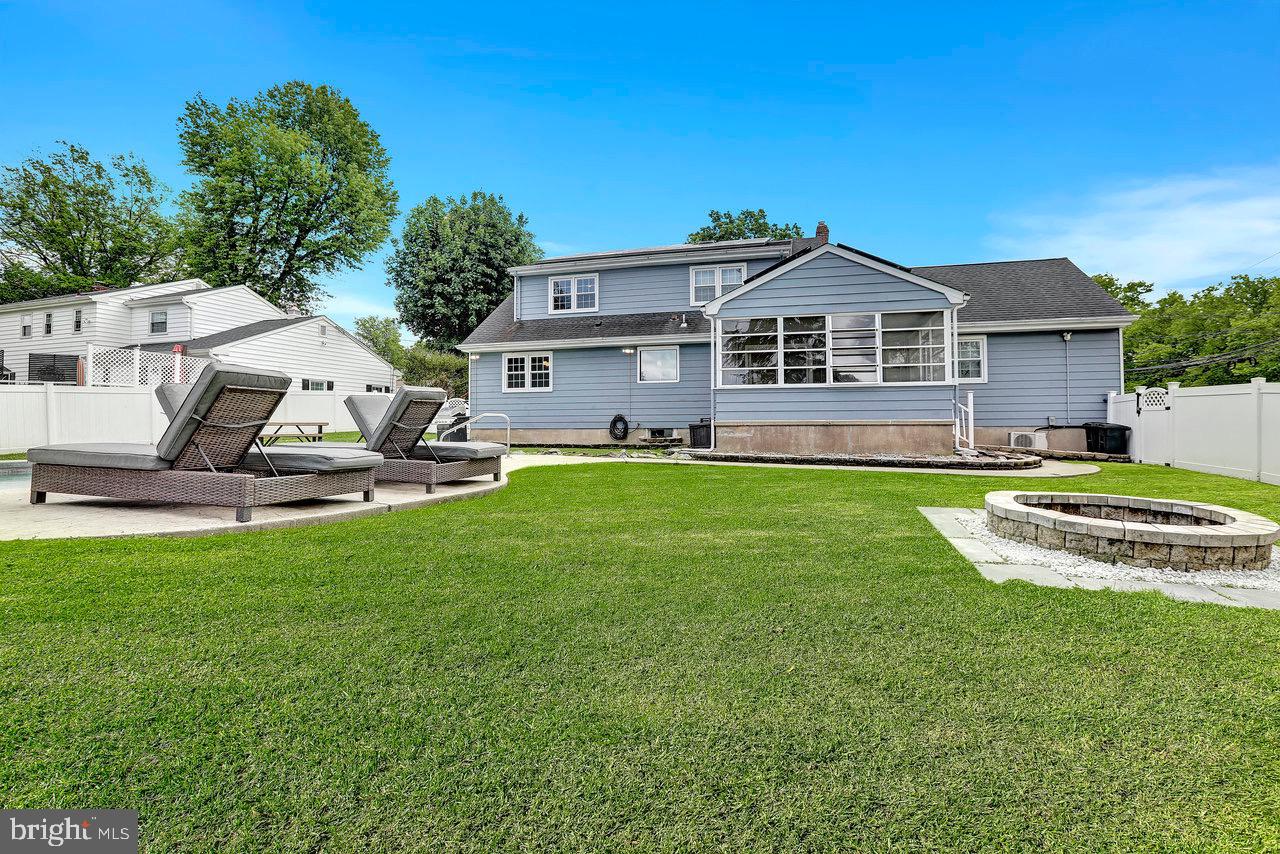 199 Applegate Drive Hamilton, NJ 08690 - Photo 37 of 40 a front view of a house with a yard