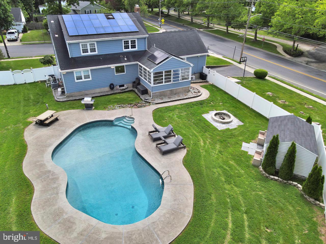 199 Applegate Drive Hamilton, NJ 08690 - Photo 40 of 40 an aerial view of a house with swimming pool garden and patio