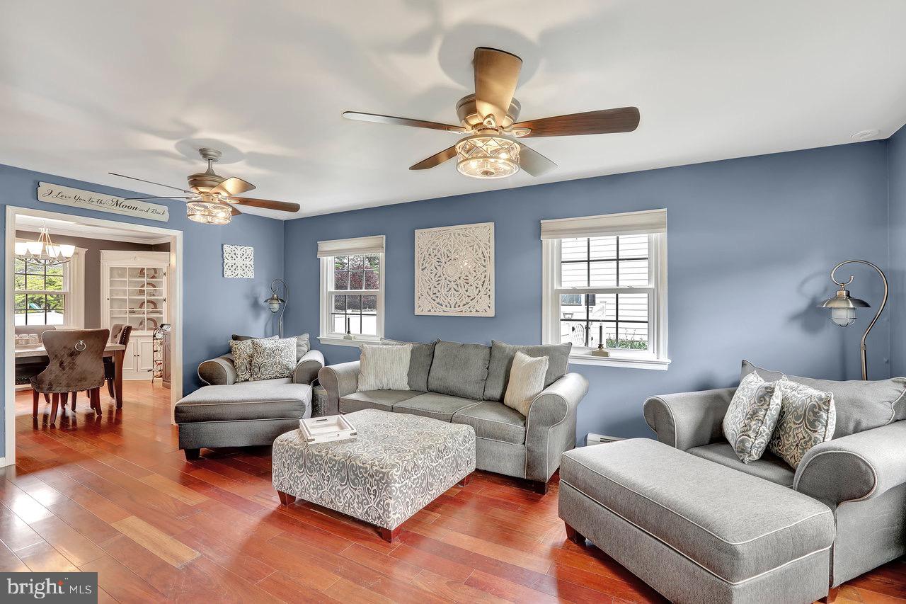 199 Applegate Drive Hamilton, NJ 08690 - Photo 6 of 40 a living room with furniture and a large window