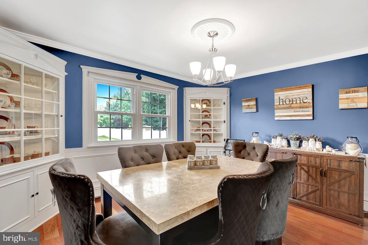199 Applegate Drive Hamilton, NJ 08690 - Photo 9 of 40 a view of a dining room with furniture window and wooden floor