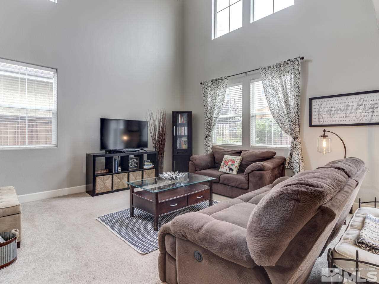 1960 Bears Ranch Drive Reno, NV 89521 - Photo 8 of 24 a living room with furniture and a flat screen tv