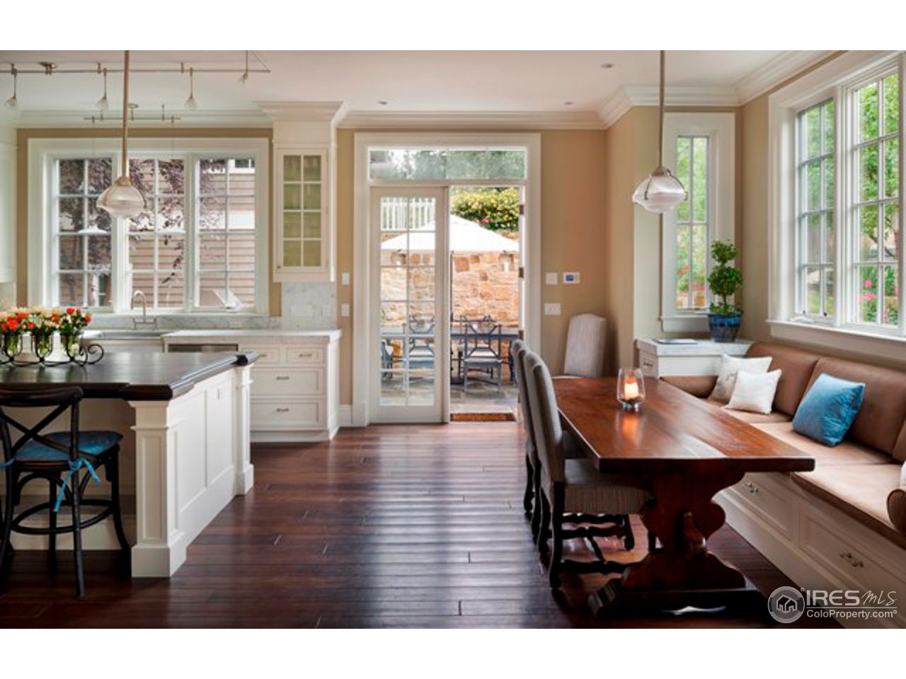 3189 5th Street Boulder, CO 80304 - Photo 13 of 25 a view of a dining room with furniture and wooden floor