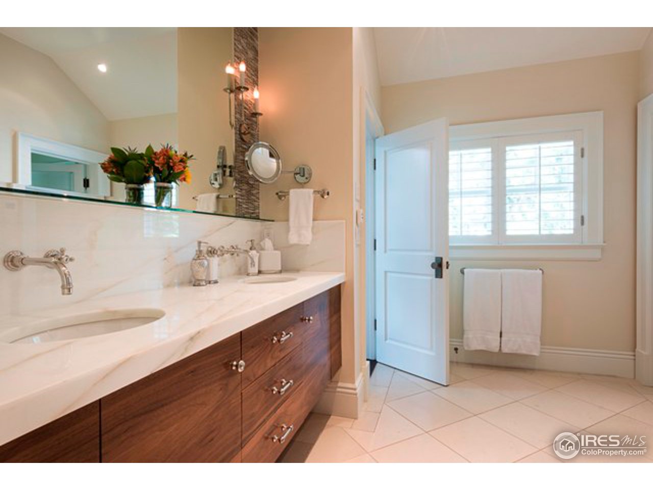 3189 5th Street Boulder, CO 80304 - Photo 18 of 25 a bathroom with a sink double vanity and a mirror