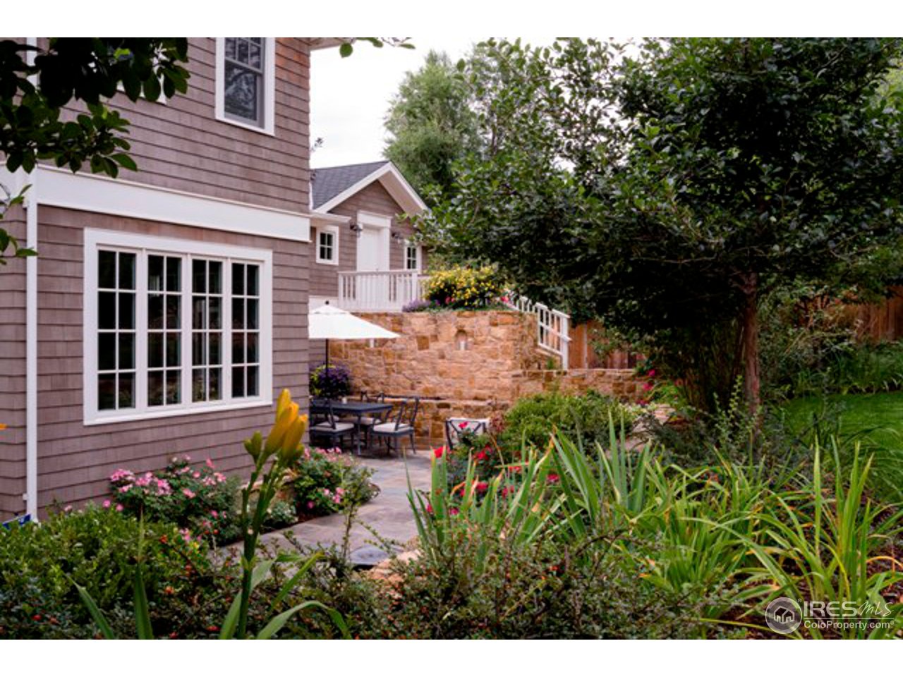 3189 5th Street Boulder, CO 80304 - Photo 4 of 25 a view of a house with garden
