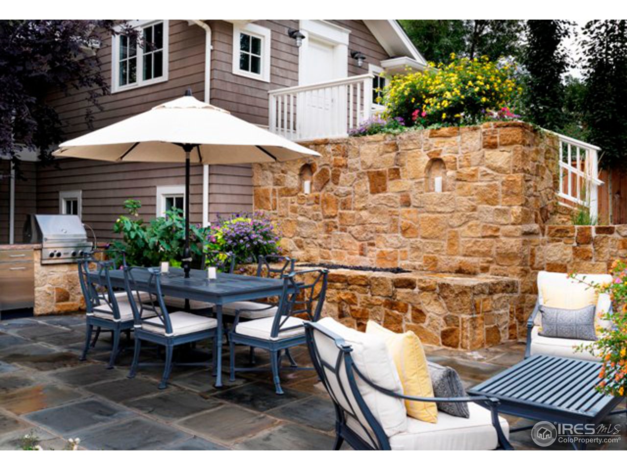 3189 5th Street Boulder, CO 80304 - Photo 6 of 25 a patio with table and chairs