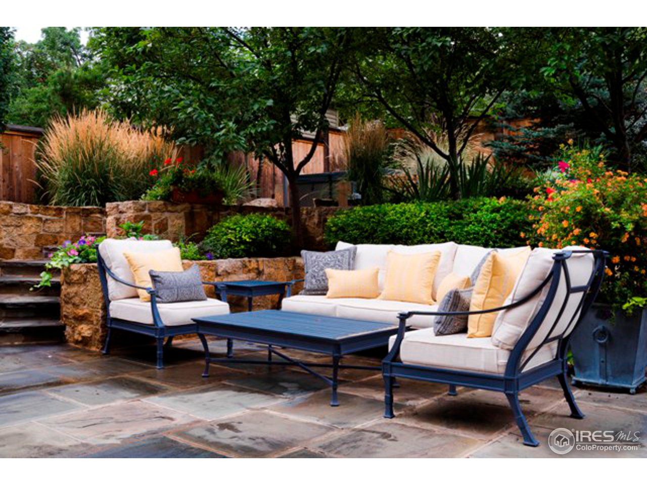 3189 5th Street Boulder, CO 80304 - Photo 7 of 25 a outdoor sitting area with furniture and a garden