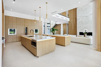 17119 Whitehaven Drive Boca Raton, FL 33496 - Photo 5 of 15 a kitchen with stainless steel appliances a sink and a large window