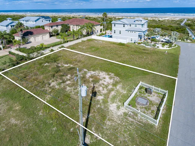 a view of a balcony with yard