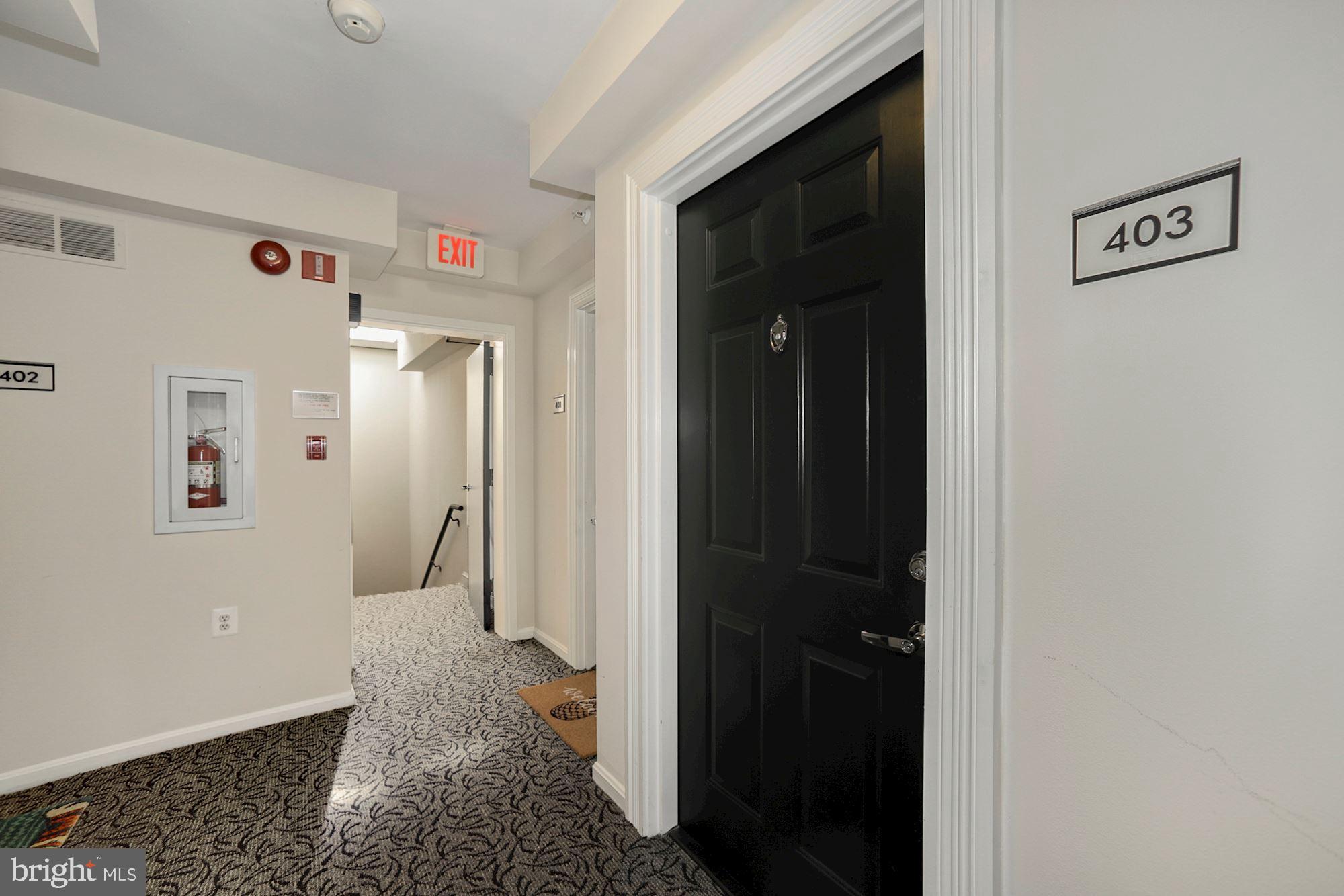 3611 38th Street Northwest, Unit 403 Washington, DC 20016 - Photo 13 of 20 Sunny entrance to the unit