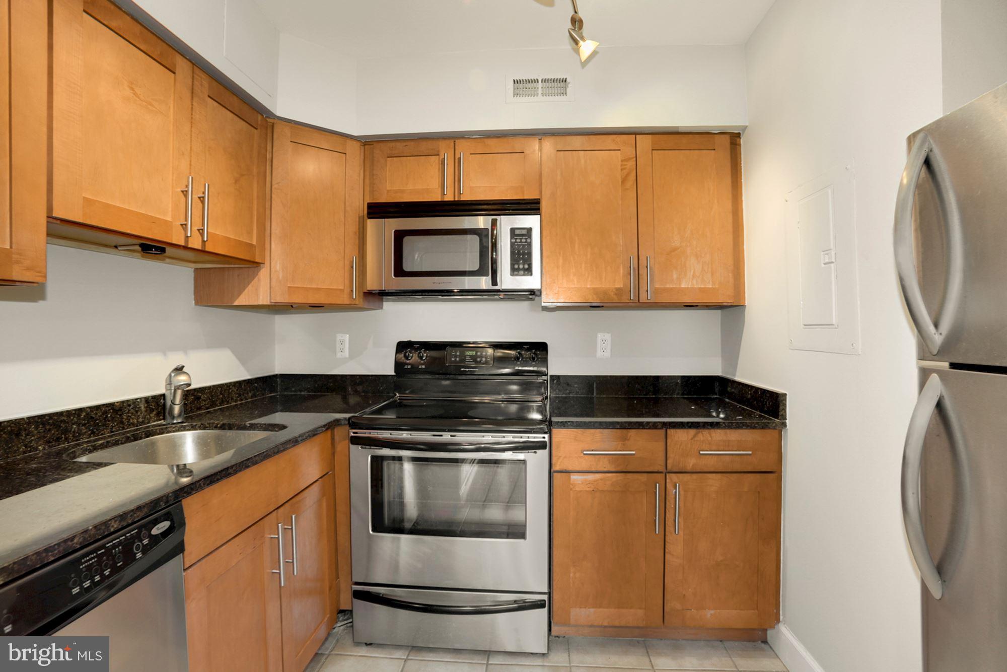3611 38th Street Northwest, Unit 403 Washington, DC 20016 - Photo 3 of 20 SS appliances granite Countertop