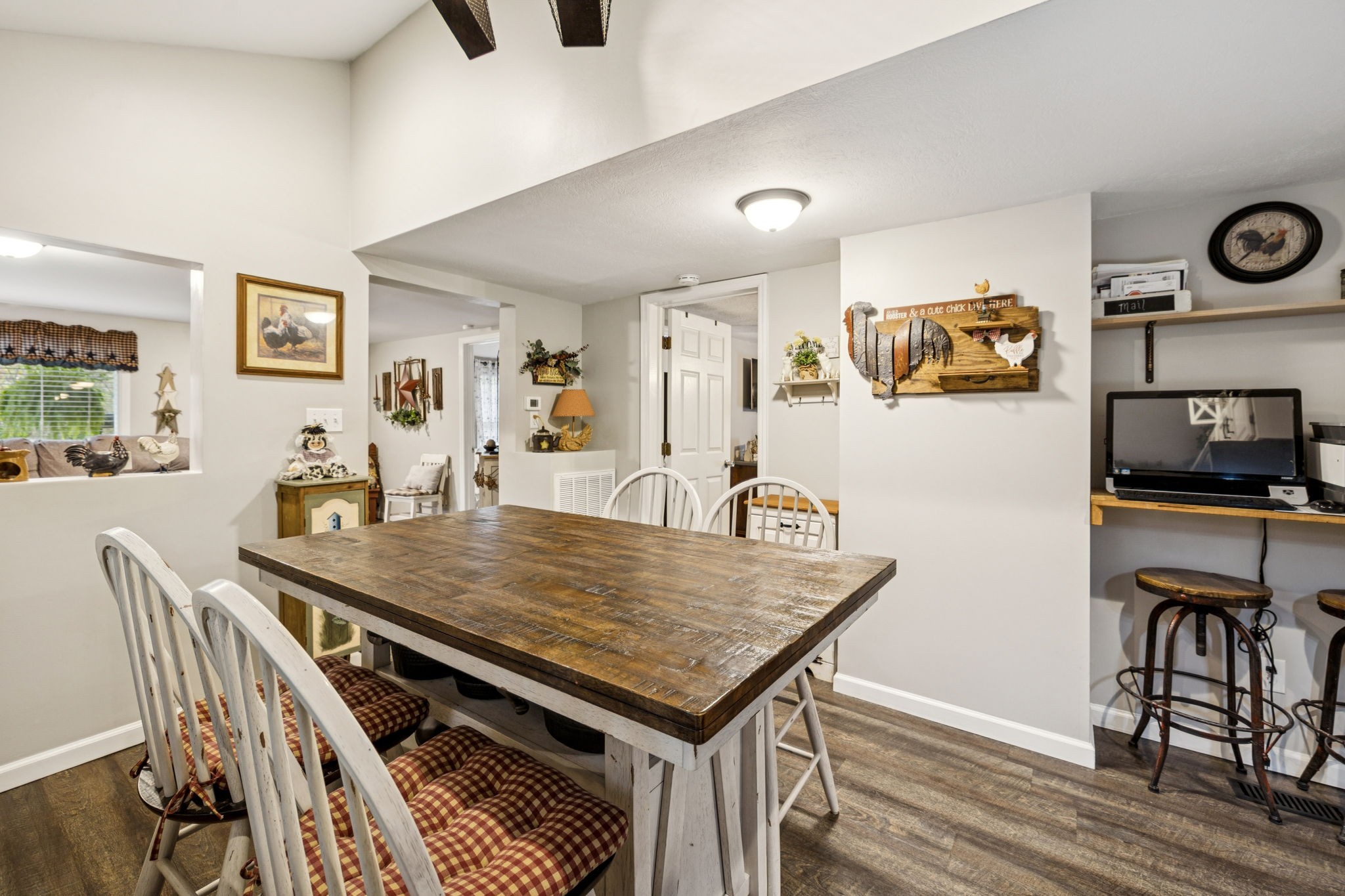 120 Tuttle Lane Bethpage, TN 37022 - Photo 12 of 26 a view of a dining room with furniture and wooden floor