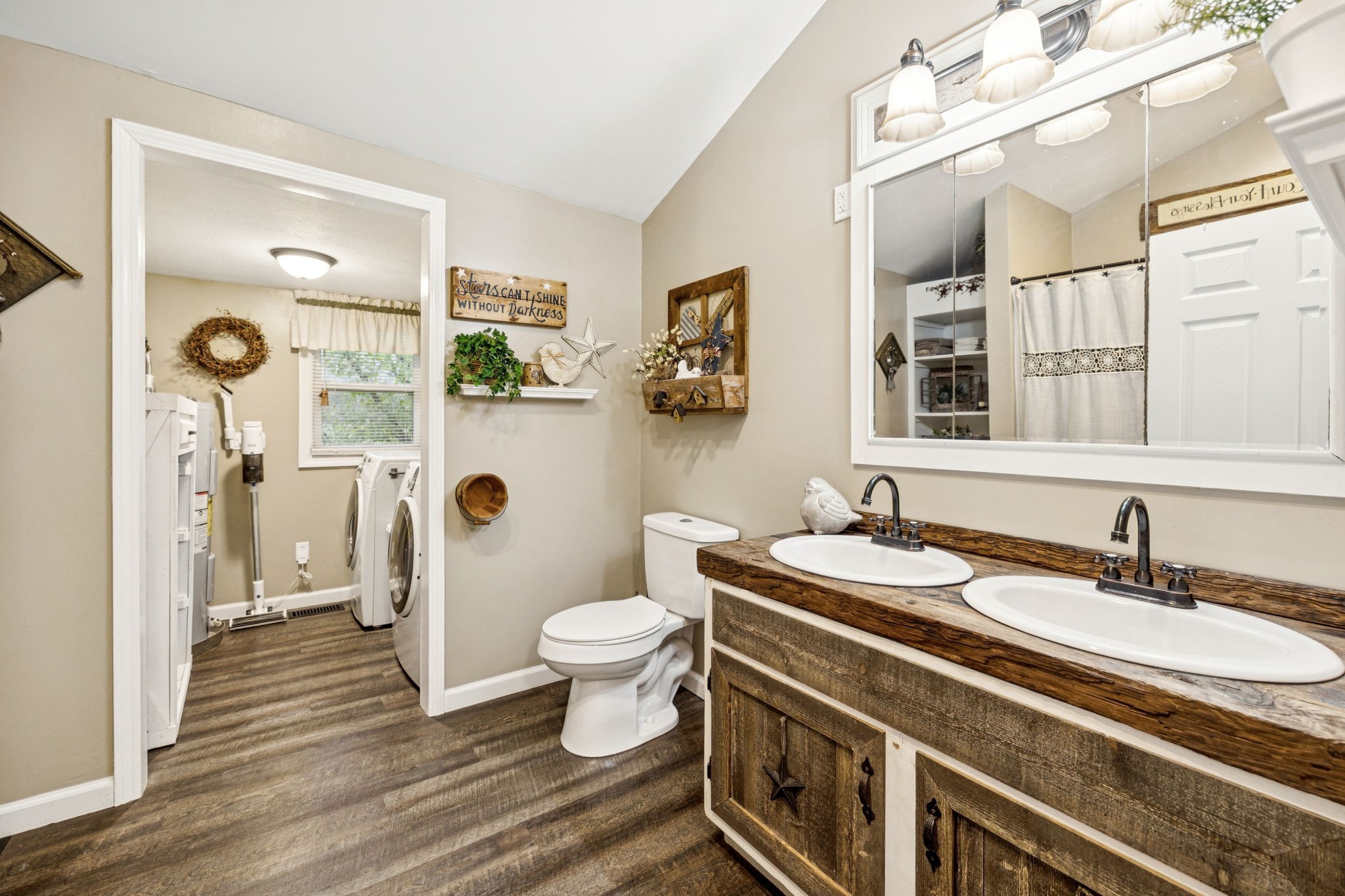 120 Tuttle Lane Bethpage, TN 37022 - Photo 14 of 26 a bathroom with a sink a toilet a mirror and shower