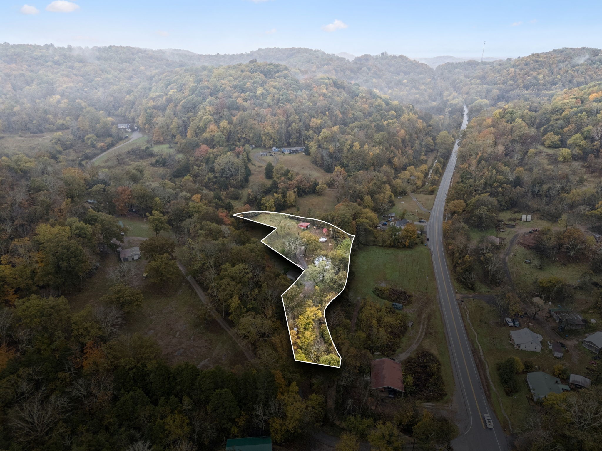 120 Tuttle Lane Bethpage, TN 37022 - Photo 22 of 26 an aerial view of a house with a mountain