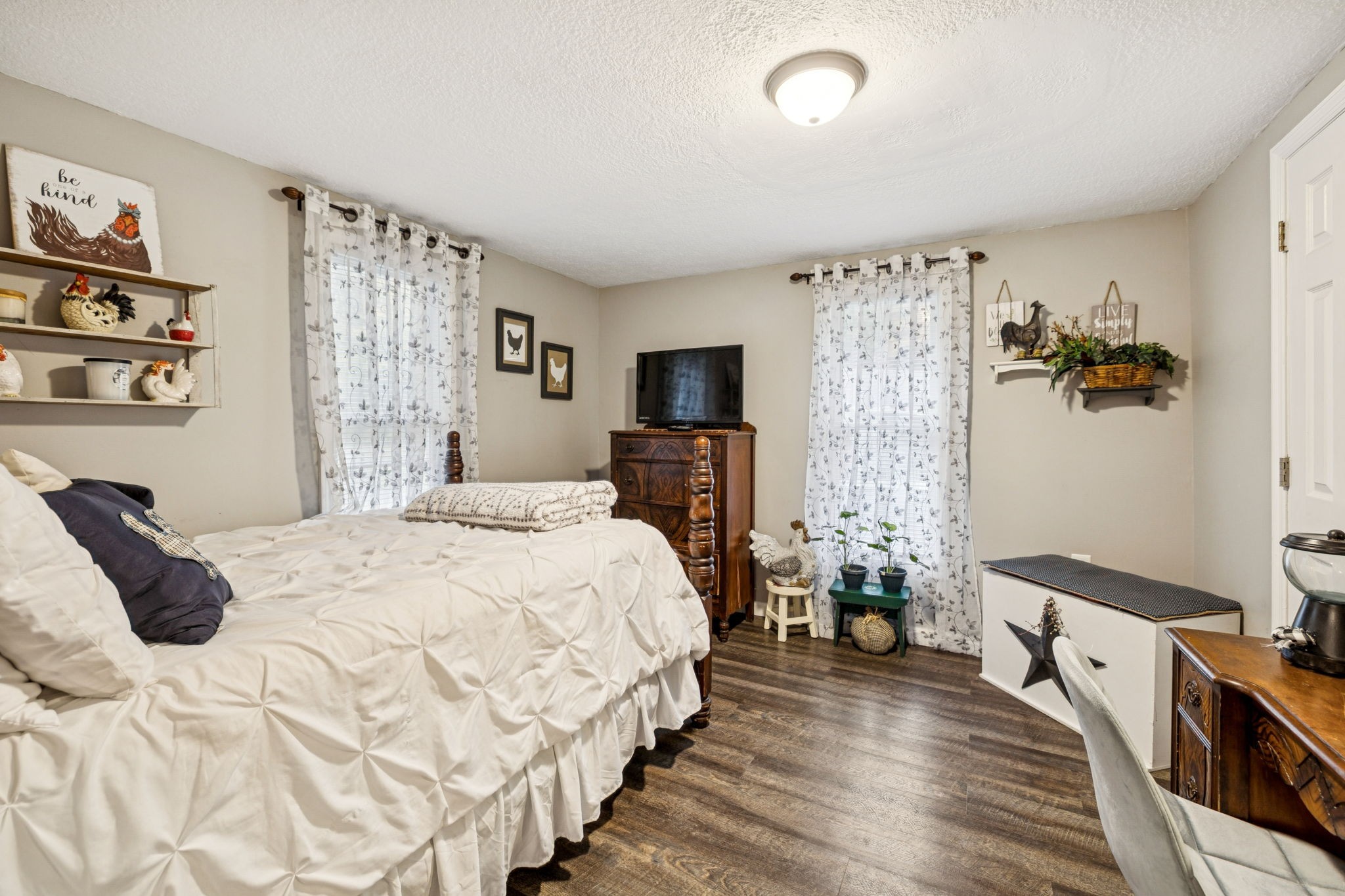 120 Tuttle Lane Bethpage, TN 37022 - Photo 9 of 26 a bedroom with a bed and a flat screen tv