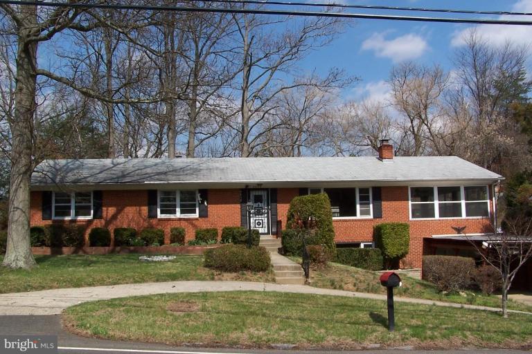 4412 Henderson Road Temple Hills, MD 20748 - Photo 1 of 13 front view of a house with a yard