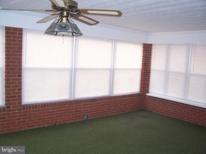 4412 Henderson Road Temple Hills, MD 20748 - Photo 2 of 13 a view of an empty room with a window