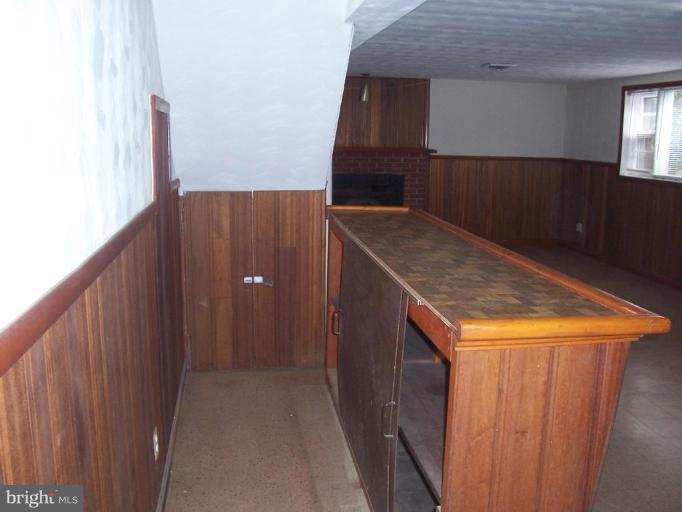 4412 Henderson Road Temple Hills, MD 20748 - Photo 4 of 13 a view of kitchen and utility room