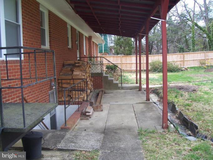 4412 Henderson Road Temple Hills, MD 20748 - Photo 5 of 13 a view of a porch with a backyard