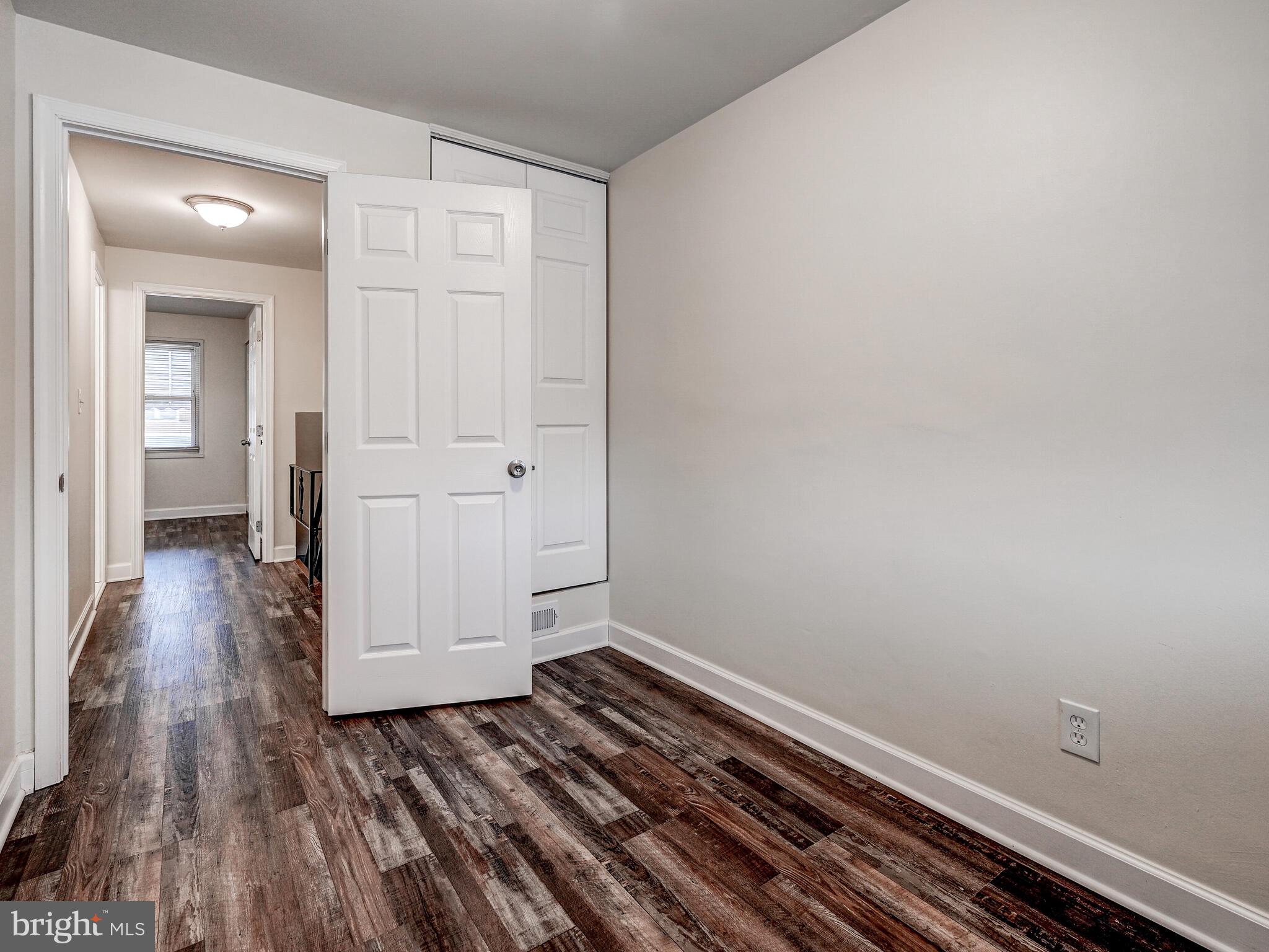 8127 Del Haven Road Dundalk, MD 21222 - Photo 12 of 25 wooden floor in an empty room