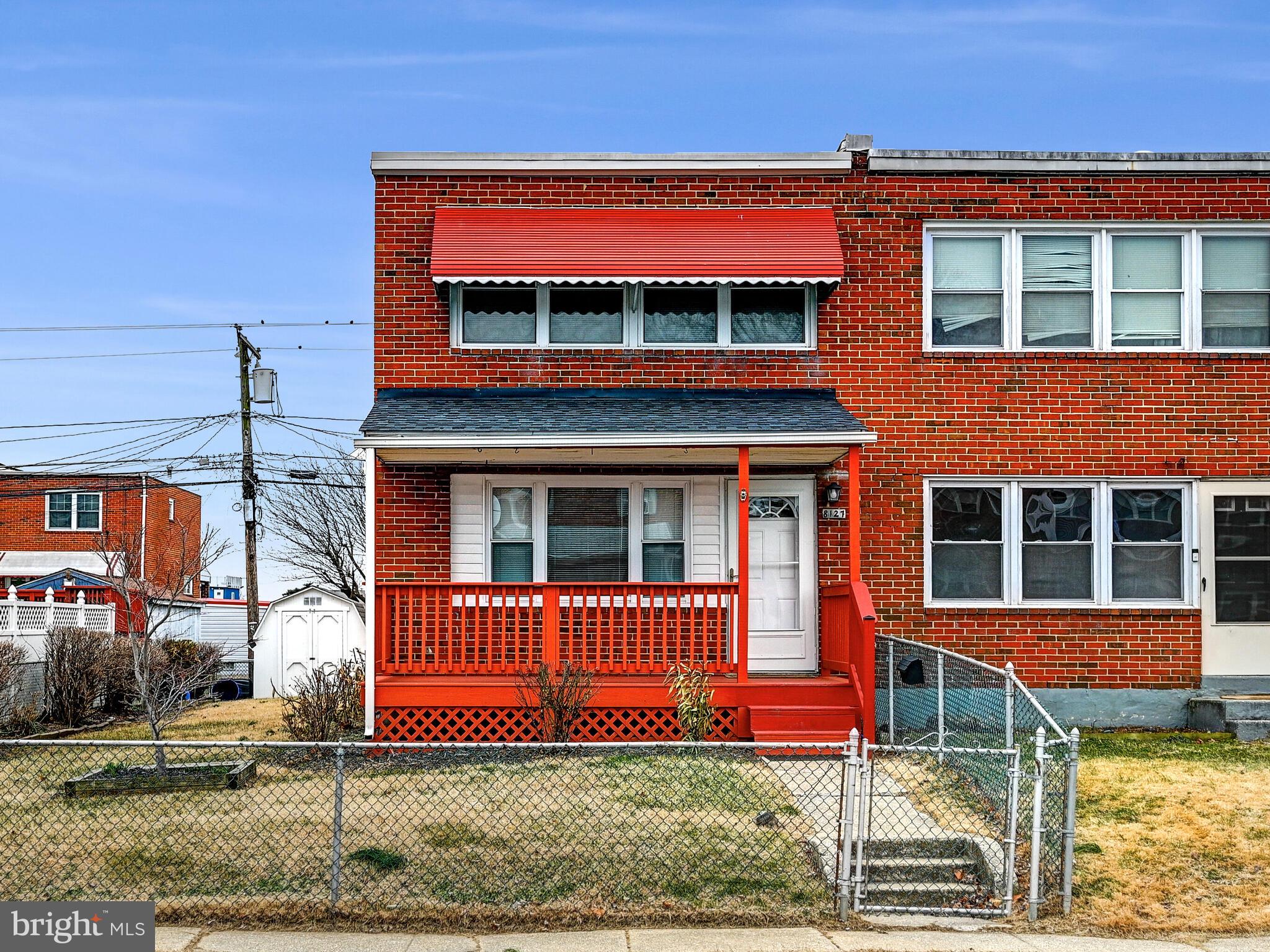 8127 Del Haven Road Dundalk, MD 21222 - Photo 2 of 25 front view of a house with a yard