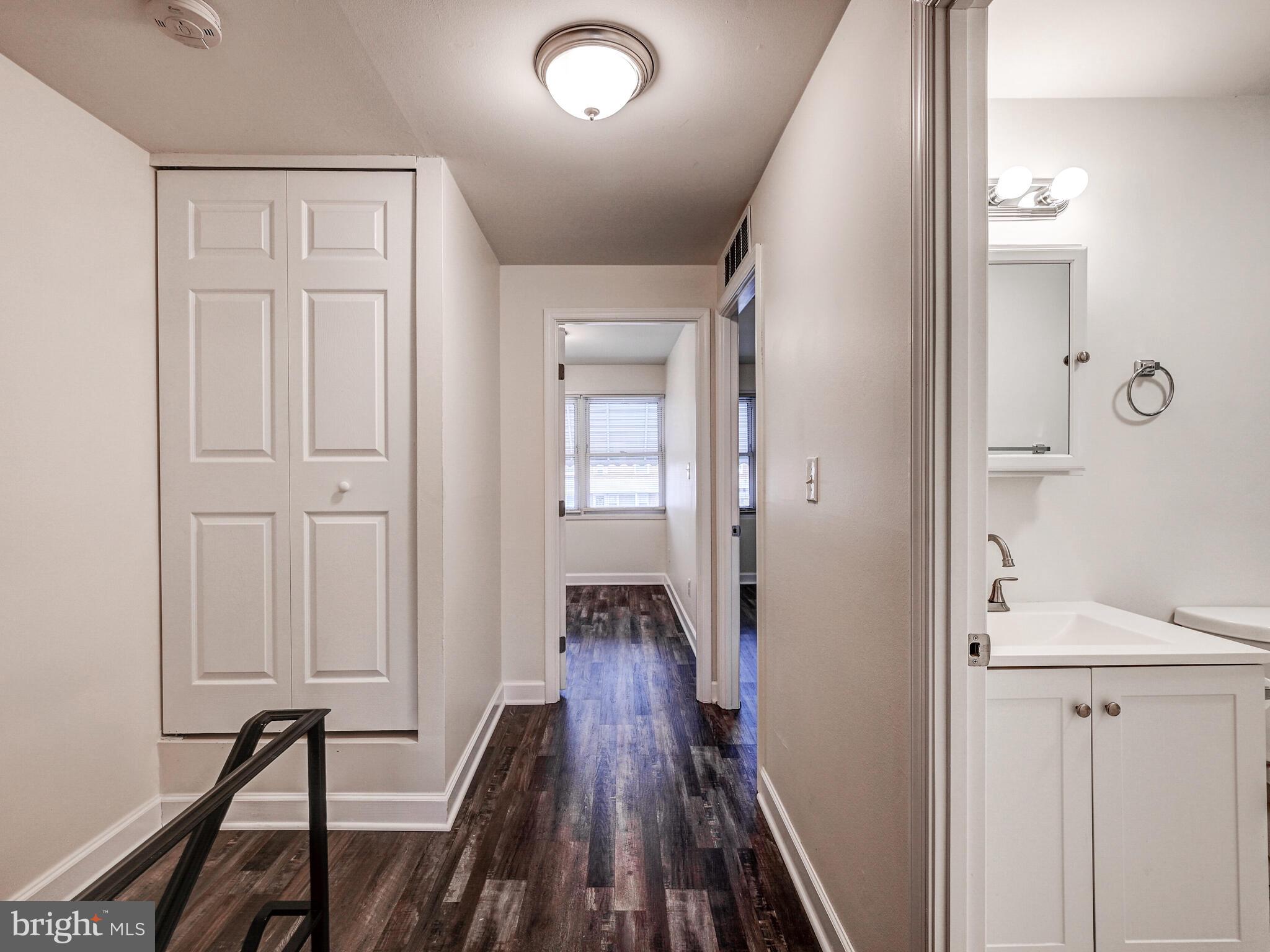 8127 Del Haven Road Dundalk, MD 21222 - Photo 10 of 25 wooden floor with white walls