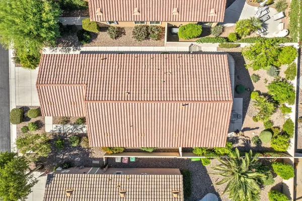 a view of a balcony with a potted plant