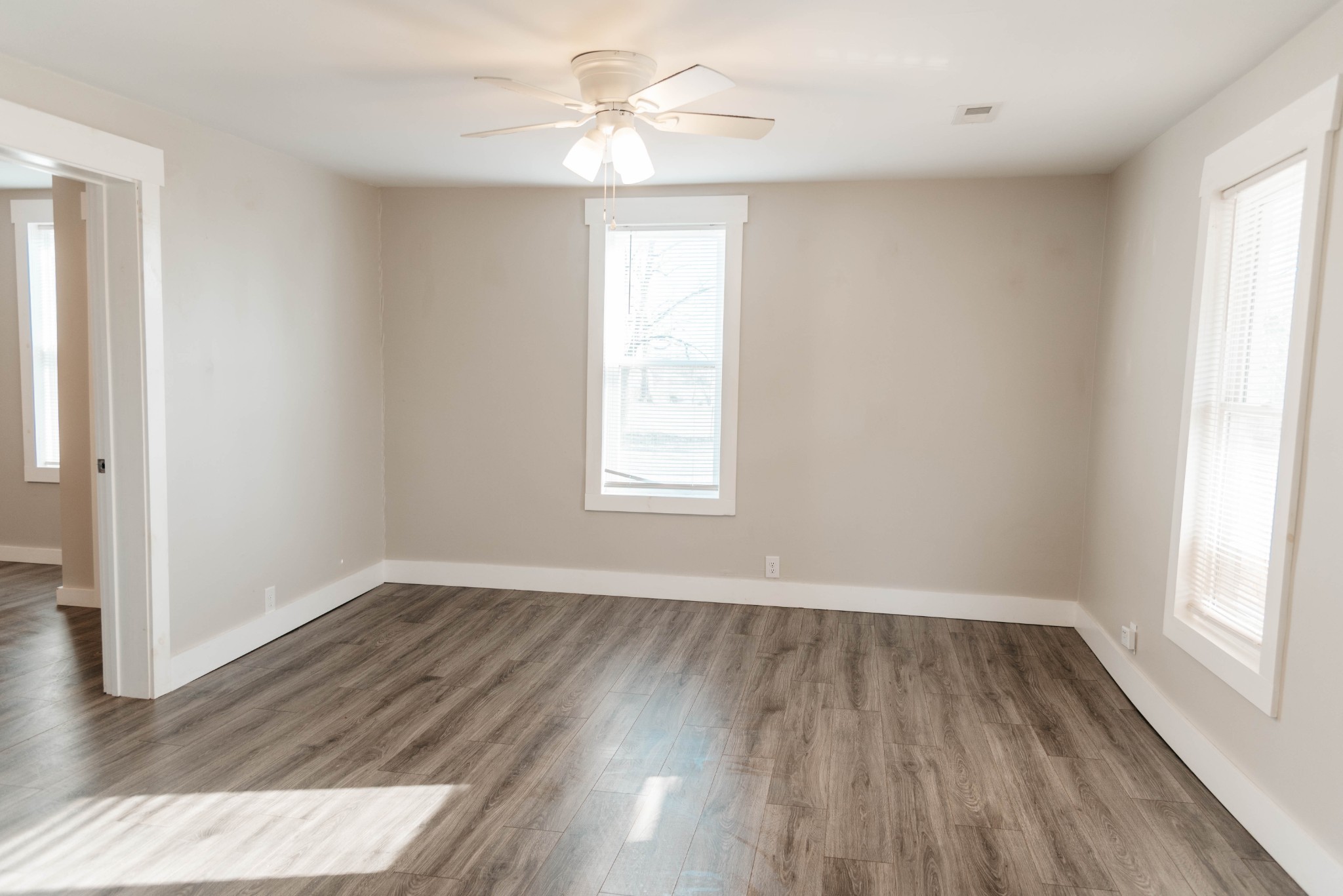 2470 Hinton Road Clarksville, TN 37043 - Photo 13 of 34 wooden floor in an empty room with a window