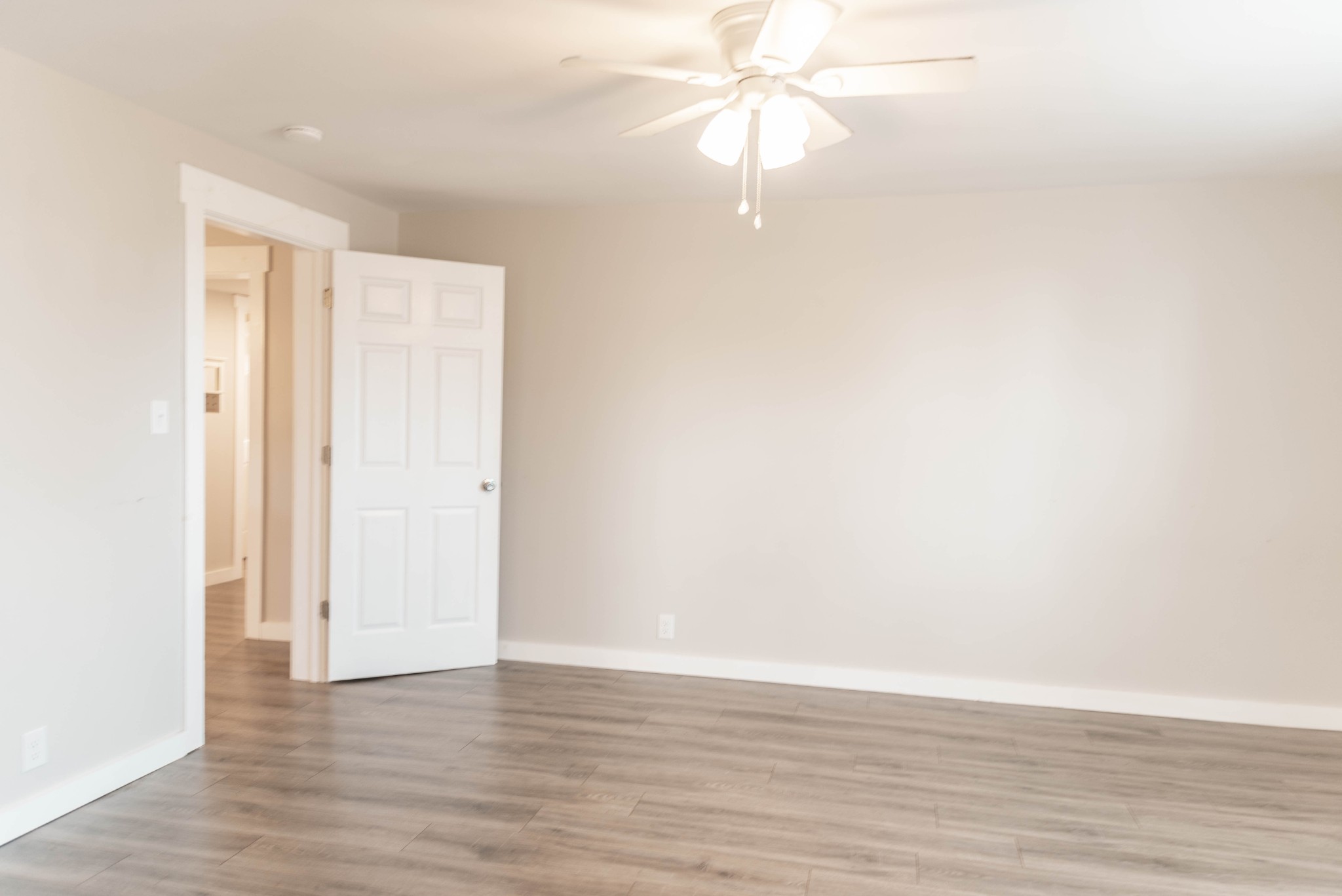 2470 Hinton Road Clarksville, TN 37043 - Photo 14 of 34 a view of an empty room with wooden floor