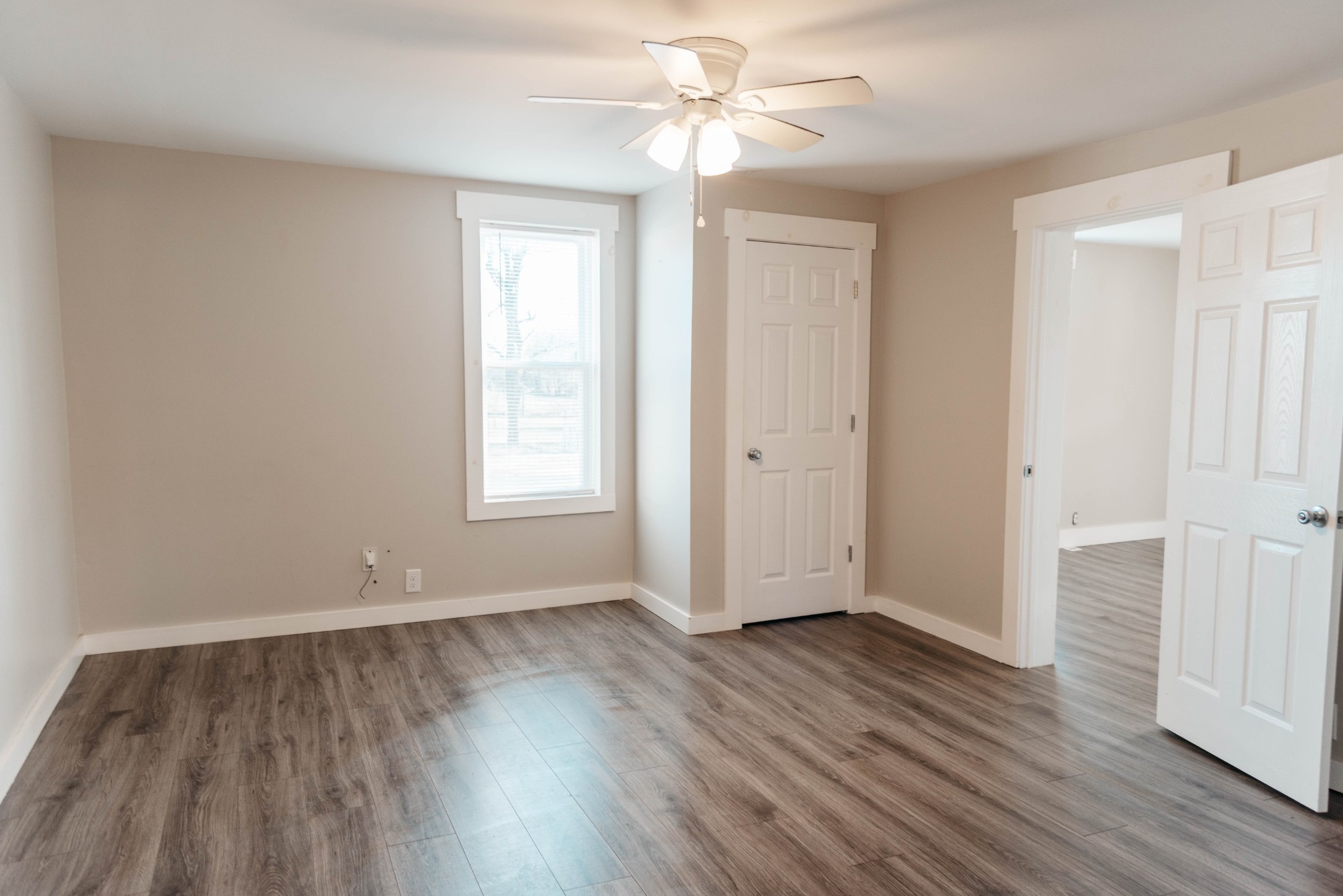 2470 Hinton Road Clarksville, TN 37043 - Photo 15 of 34 wooden floor in an empty room with a window
