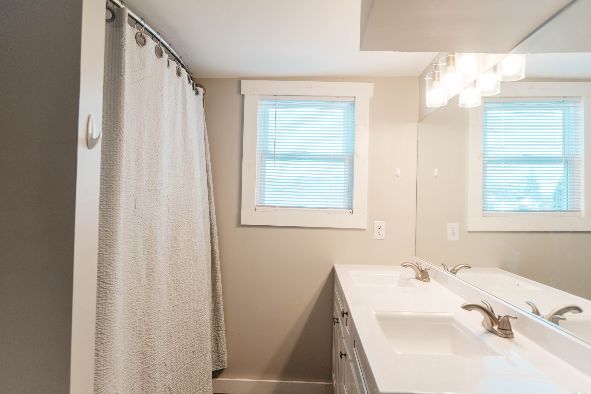 2470 Hinton Road Clarksville, TN 37043 - Photo 20 of 34 a bathroom with a sink and a mirror