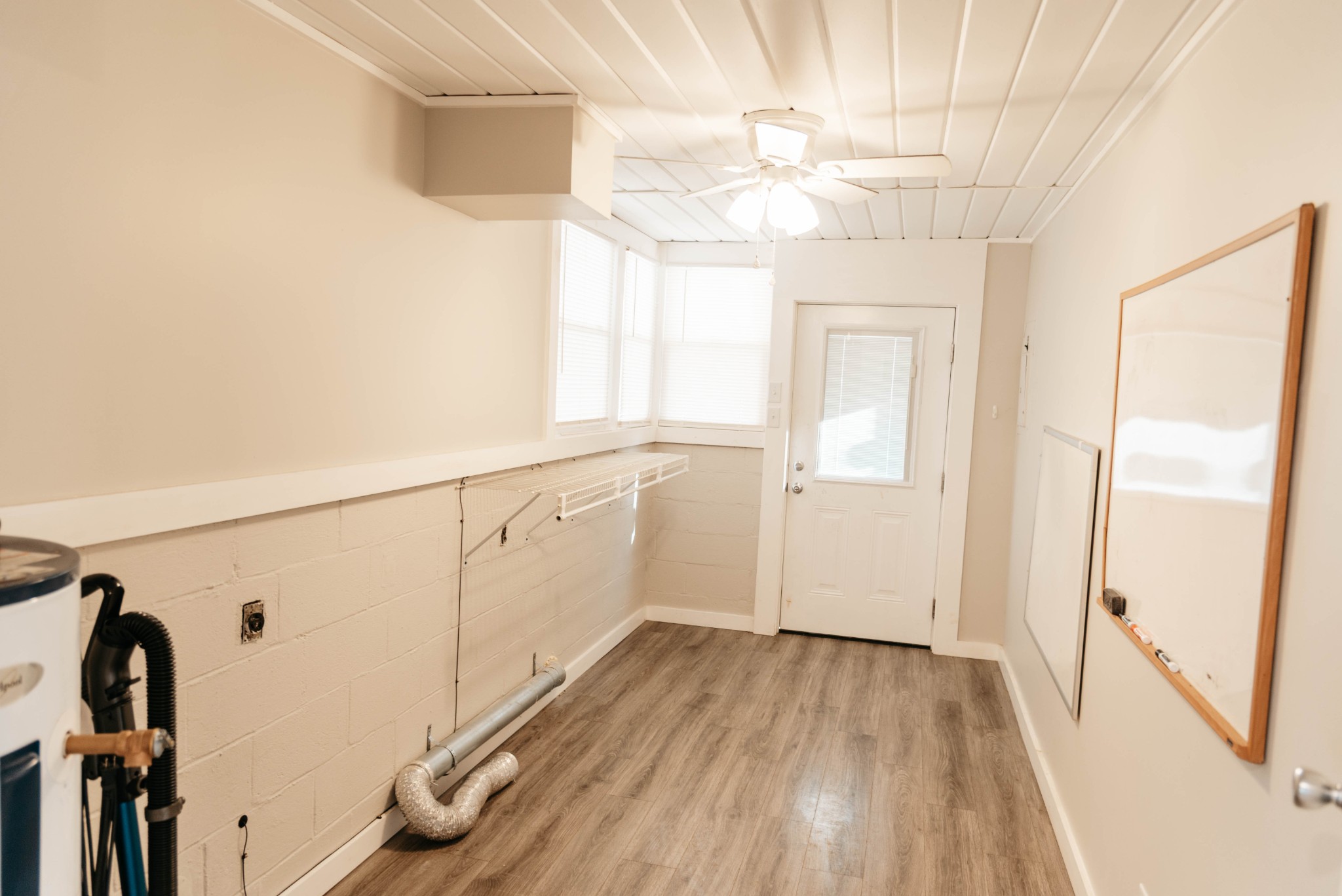 2470 Hinton Road Clarksville, TN 37043 - Photo 24 of 34 a view of a hallway with wooden floor and staircase