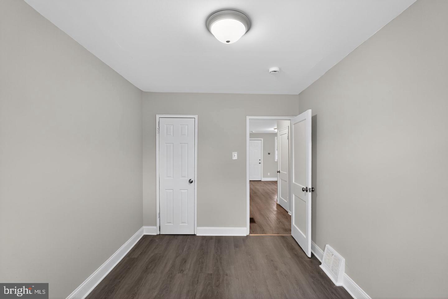 1001 Burnside Road Sharon Hill, PA 19079 - Photo 11 of 21 wooden floor in an empty room with a window