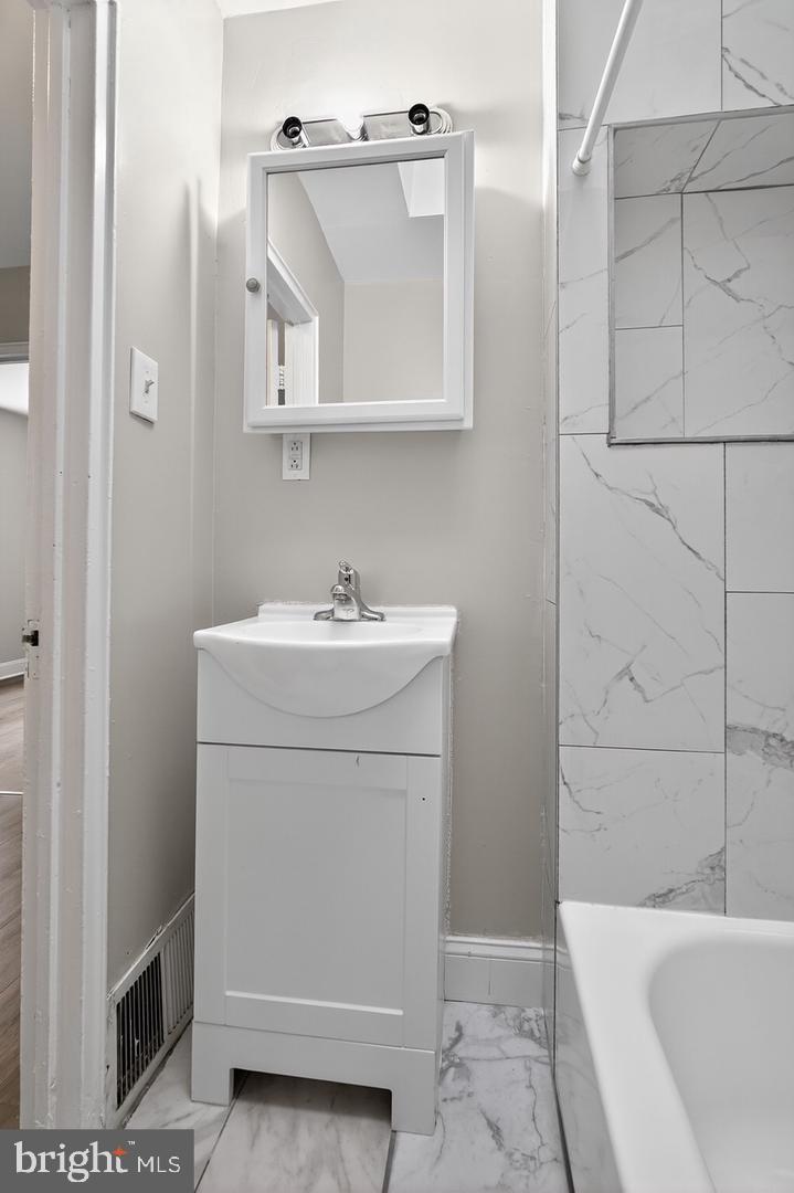 1001 Burnside Road Sharon Hill, PA 19079 - Photo 12 of 21 a utility room with dryer and washer
