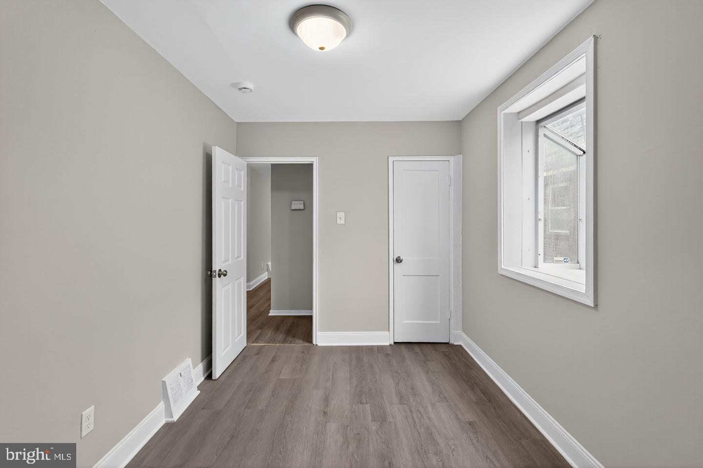 1001 Burnside Road Sharon Hill, PA 19079 - Photo 15 of 21 a view of a room with wooden floor and windows