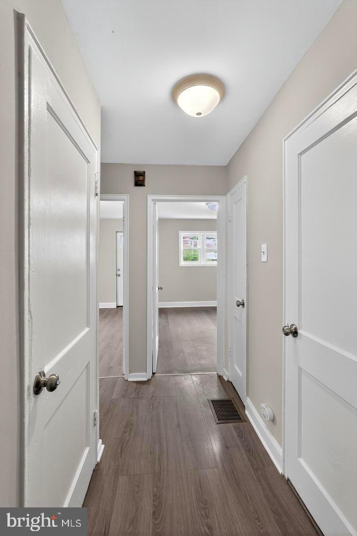 1001 Burnside Road Sharon Hill, PA 19079 - Photo 9 of 21 a view of a hallway with wooden floor