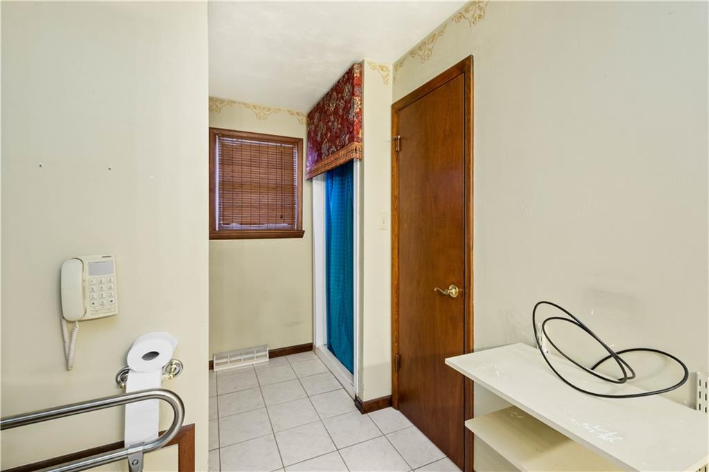 105 Trump Road Cheswick, PA 15024 - Photo 13 of 25 a view of a storage & utility room with racks on the wall
