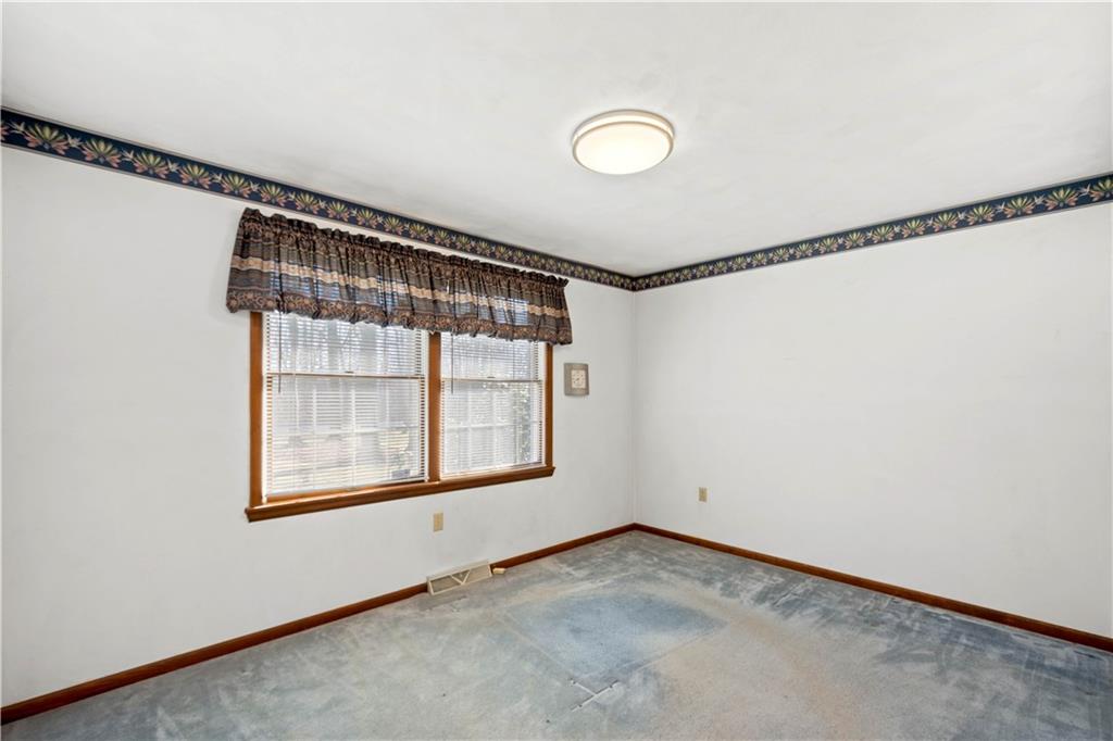 105 Trump Road Cheswick, PA 15024 - Photo 14 of 25 a view of empty room with windows