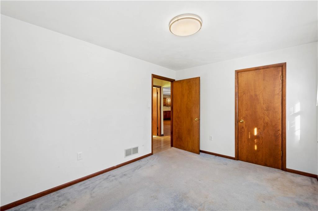 105 Trump Road Cheswick, PA 15024 - Photo 17 of 25 a view of an empty room and window