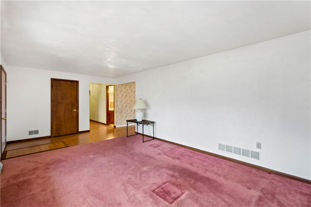 105 Trump Road Cheswick, PA 15024 - Photo 6 of 25 an empty room with windows