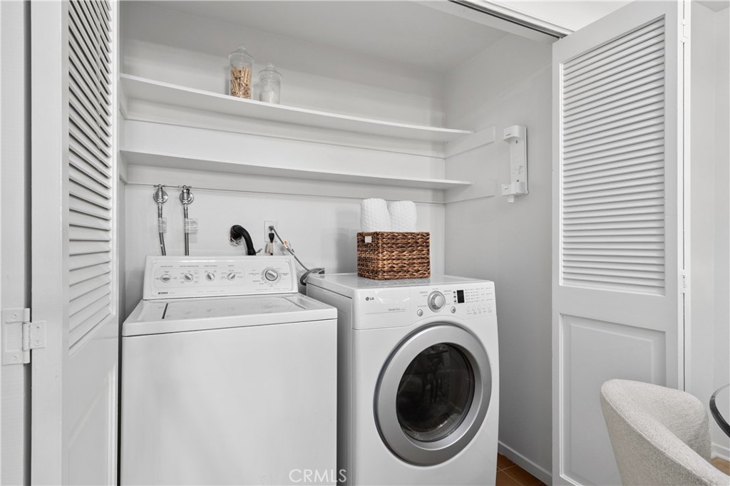11687 Bellagio Road, Unit 12 Los Angeles, CA 90049 - Photo 17 of 50 Indoor laundry space in the multi-purpose nook area.