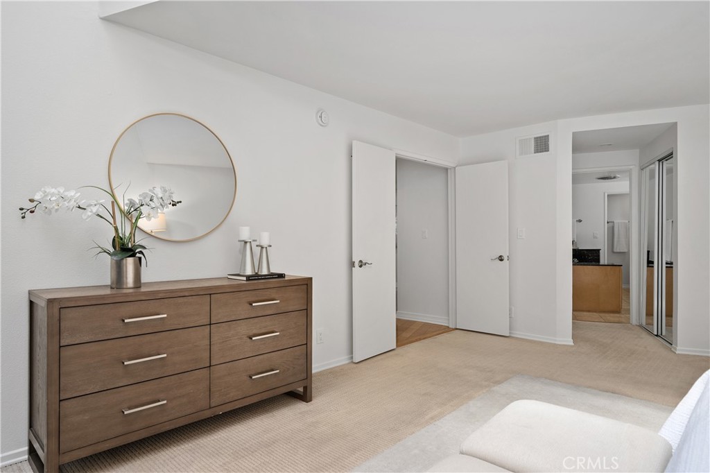 11687 Bellagio Road, Unit 12 Los Angeles, CA 90049 - Photo 21 of 50 Double door entry into the primary suite.
