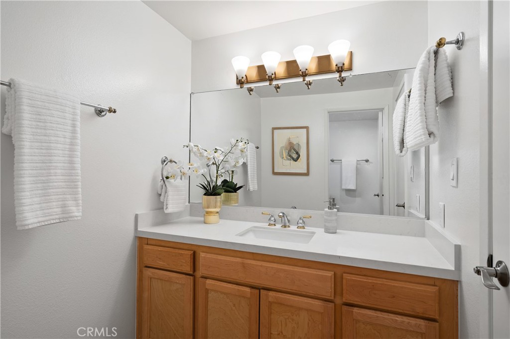 11687 Bellagio Road, Unit 12 Los Angeles, CA 90049 - Photo 35 of 50 Second bedroom suite bathroom with separate shower area, and private water closet.