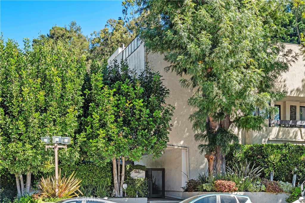 11687 Bellagio Road, Unit 12 Los Angeles, CA 90049 - Photo 38 of 50 Gated entry with controlled access for security and privacy