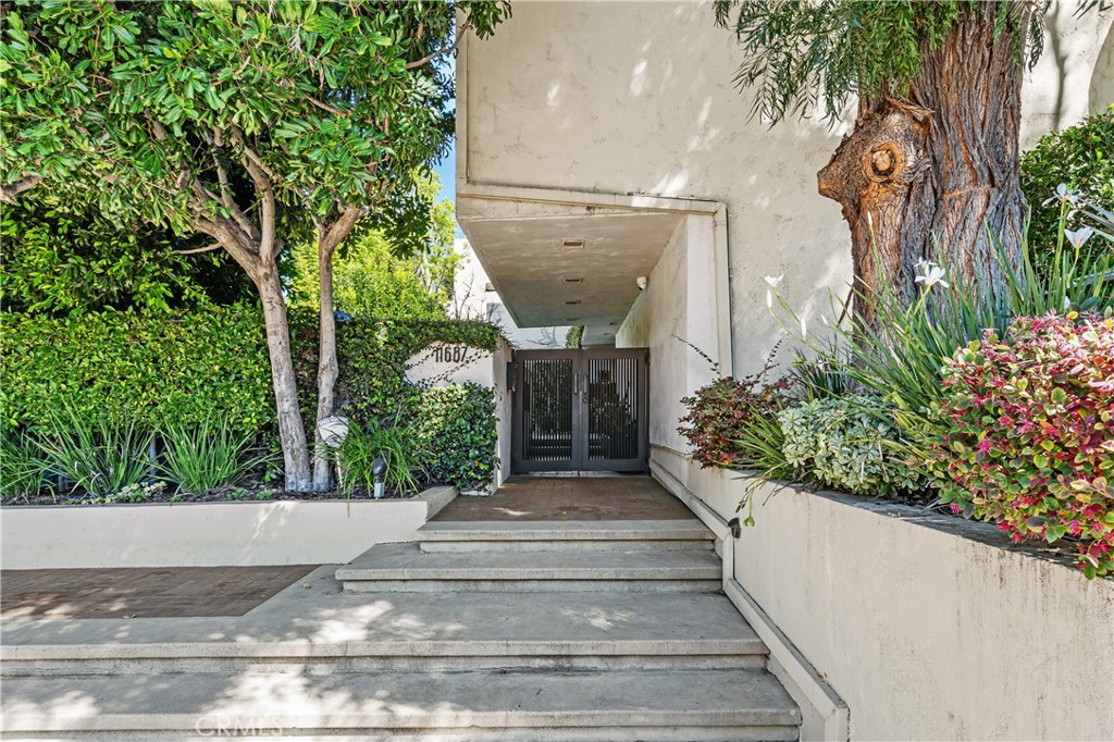 11687 Bellagio Road, Unit 12 Los Angeles, CA 90049 - Photo 39 of 50 Gated entry with controlled access for security and privacy