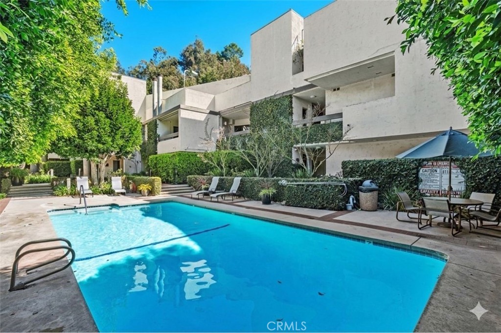 11687 Bellagio Road, Unit 12 Los Angeles, CA 90049 - Photo 40 of 50 Heated pool