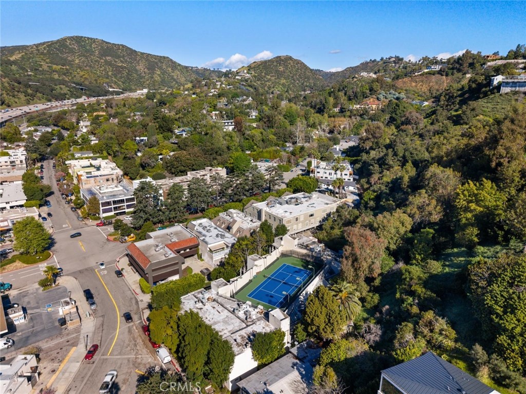 11687 Bellagio Road, Unit 12 Los Angeles, CA 90049 - Photo 46 of 50 Entrance of Moraga Dr. & Bellagio Rd. Neighborhood dining, and everyday conveniences, complete the setting!