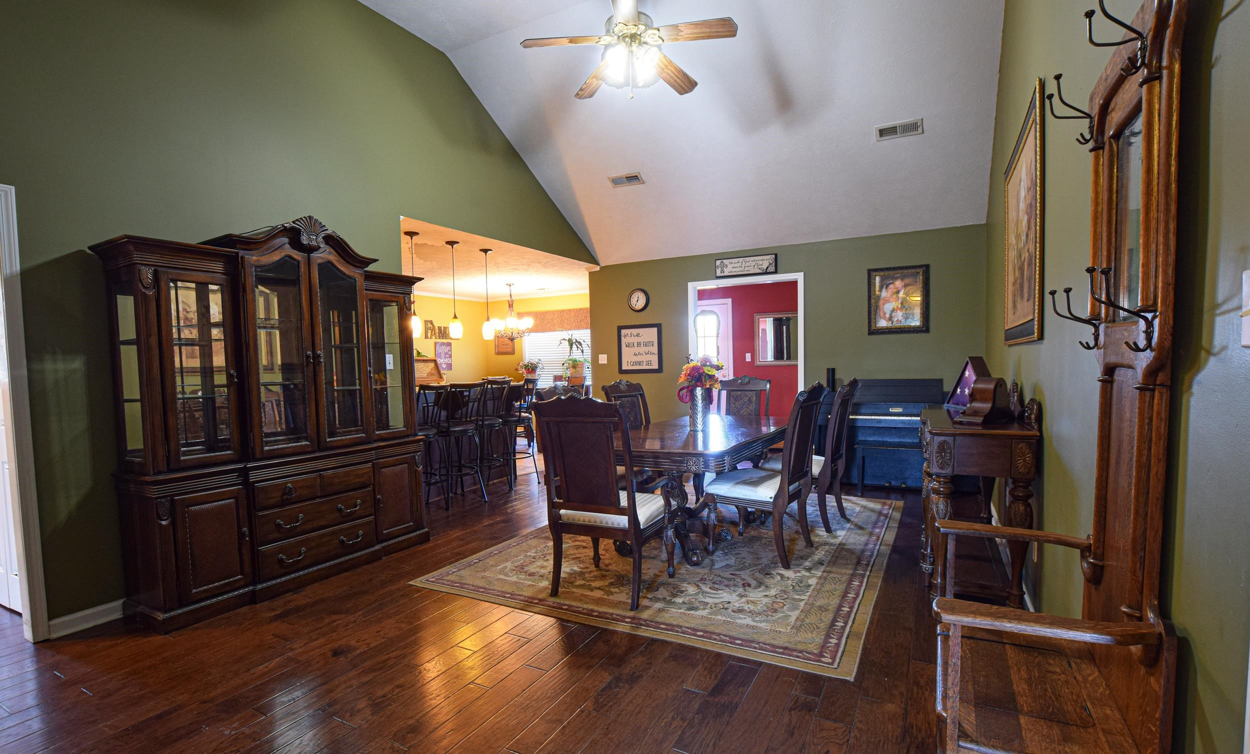 2086 Arlan Reason Road Bells, TN 38006 - Photo 9 of 24 a view of a dining room with furniture and chandelier